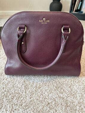 Kate Spade plum/red pebbled leather satchel with gold hardware